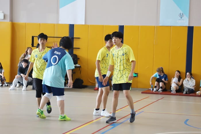 Boys playing volleyball