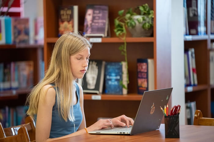 Students working on a laptop