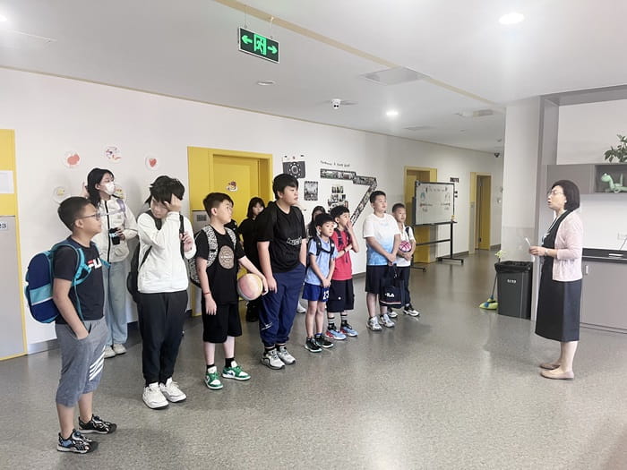 Students in the dorm preparing for an activity