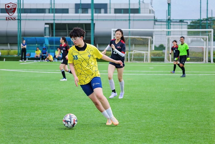 Girl playing soccer