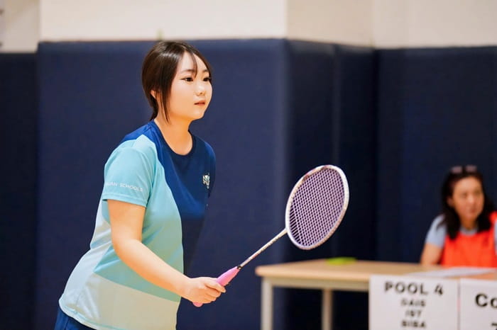 Girl playing badminton