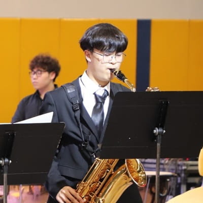 Justin, baritone saxophone