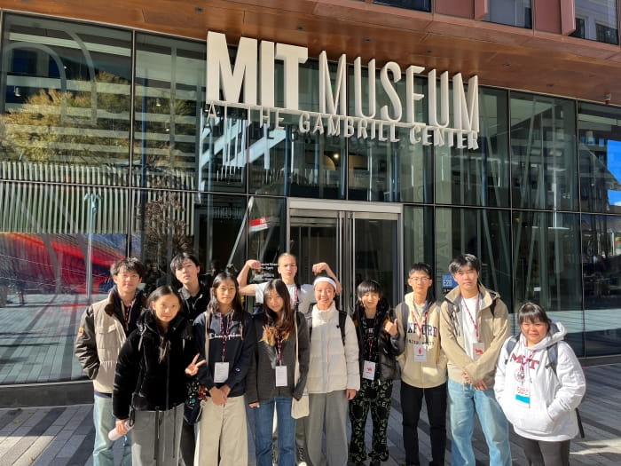students in front of the MIT museum