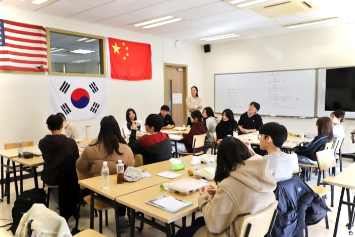 Korean students meet in a classroom