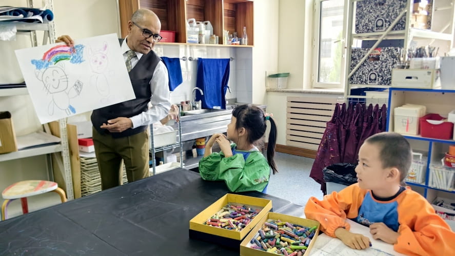 Mr. Martin with Early Years kids