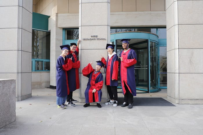 Senior students in front of the secondary school